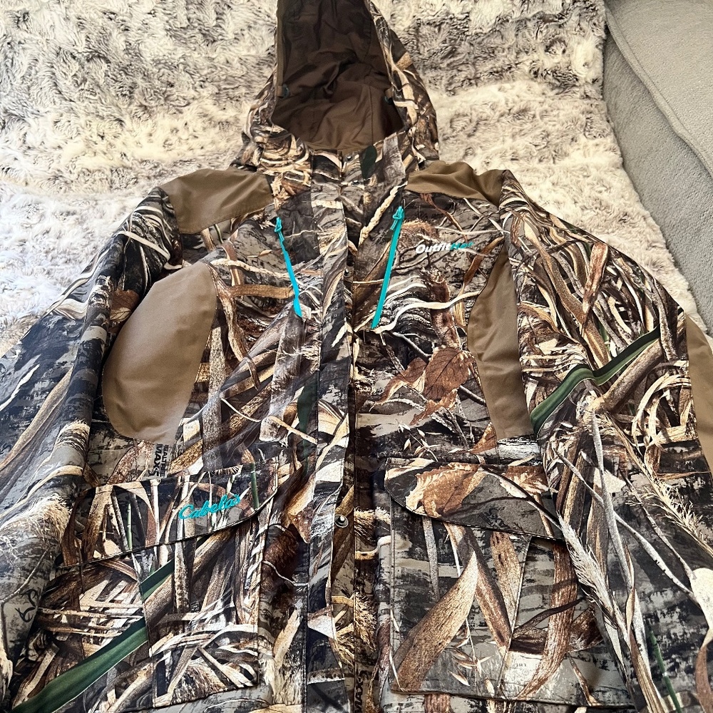 Cabela’s OutfitHER waterproof camo jacket